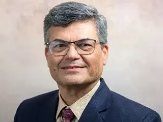 De Amulya Gurutu Business Administration & Professor
