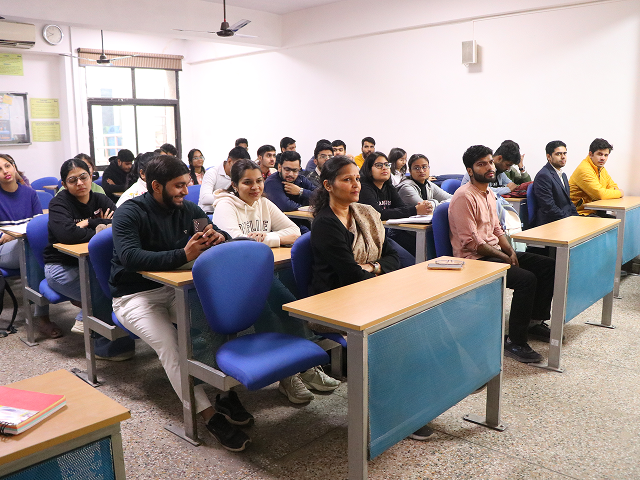 speaker explaining payroll components