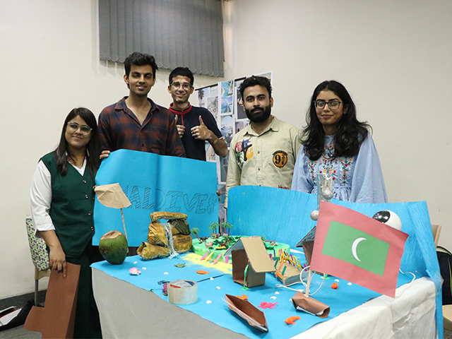 students presenting country analysis