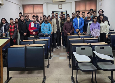 finance expert addressing students