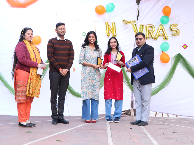 winners receiving trophies